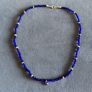 Beaded evil eye heart charm necklace